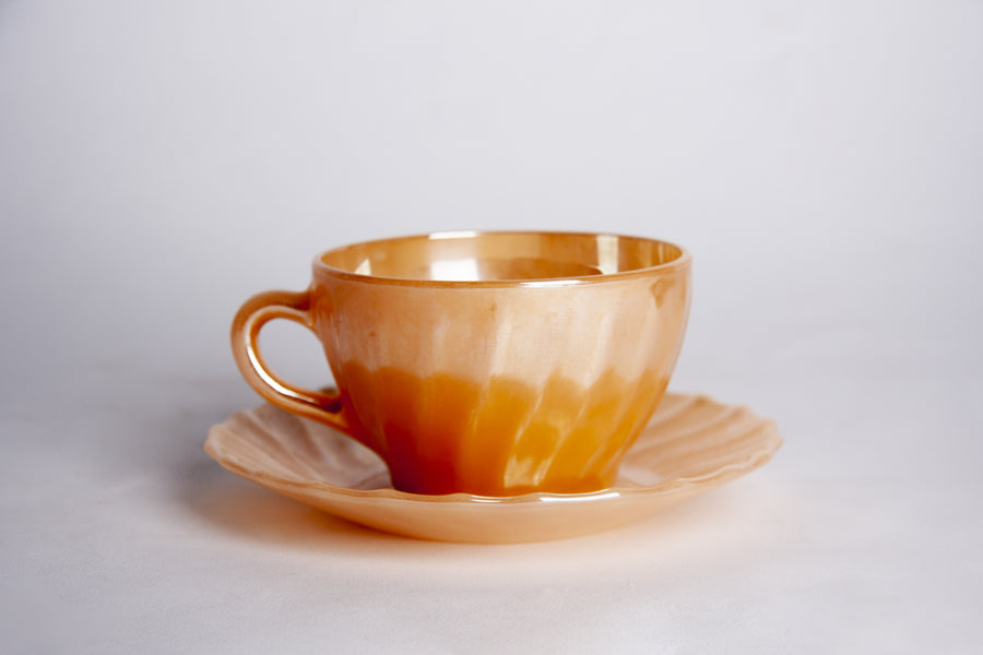 Tea cups with sugar bowl